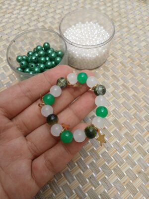 Azadi Pearl Bracelet | Green & White Beaded Bracelet with Star Charms